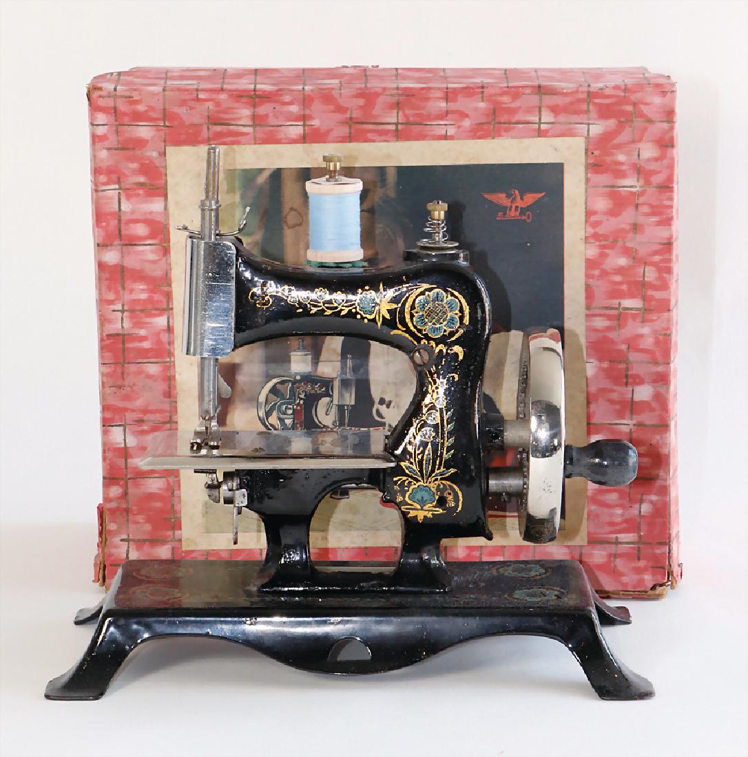 CASIGE sewing machine, No. 13 with fascia cover, spiral (1 of 1)