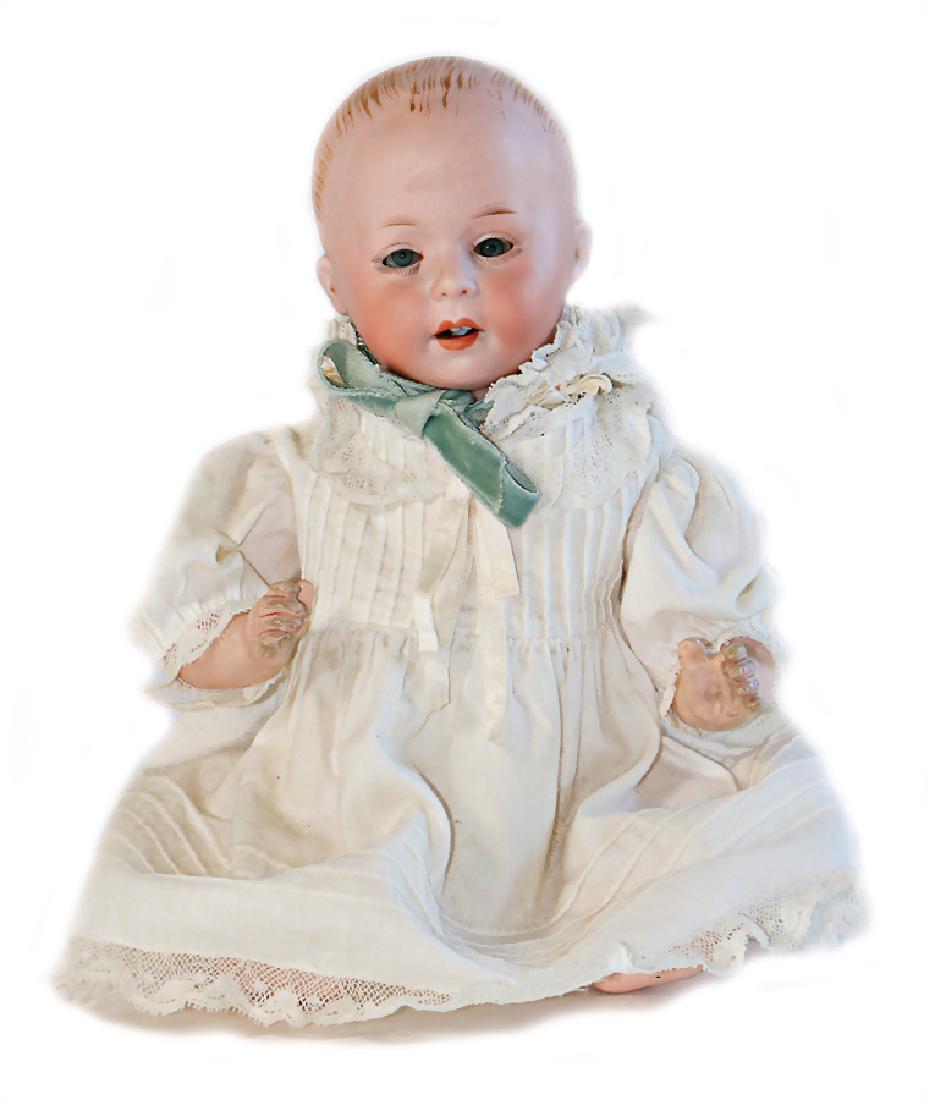 SWAINE & CO bisque porcelain full head, mark in the: SWAINE & CO bisque porcelain full head, mark in the neck: Germany 232, boy, blue glass eyes, opened mouth, line of teeth, 1 tooth is knocked, mass baby with sitting body, 19 cm German Description 
