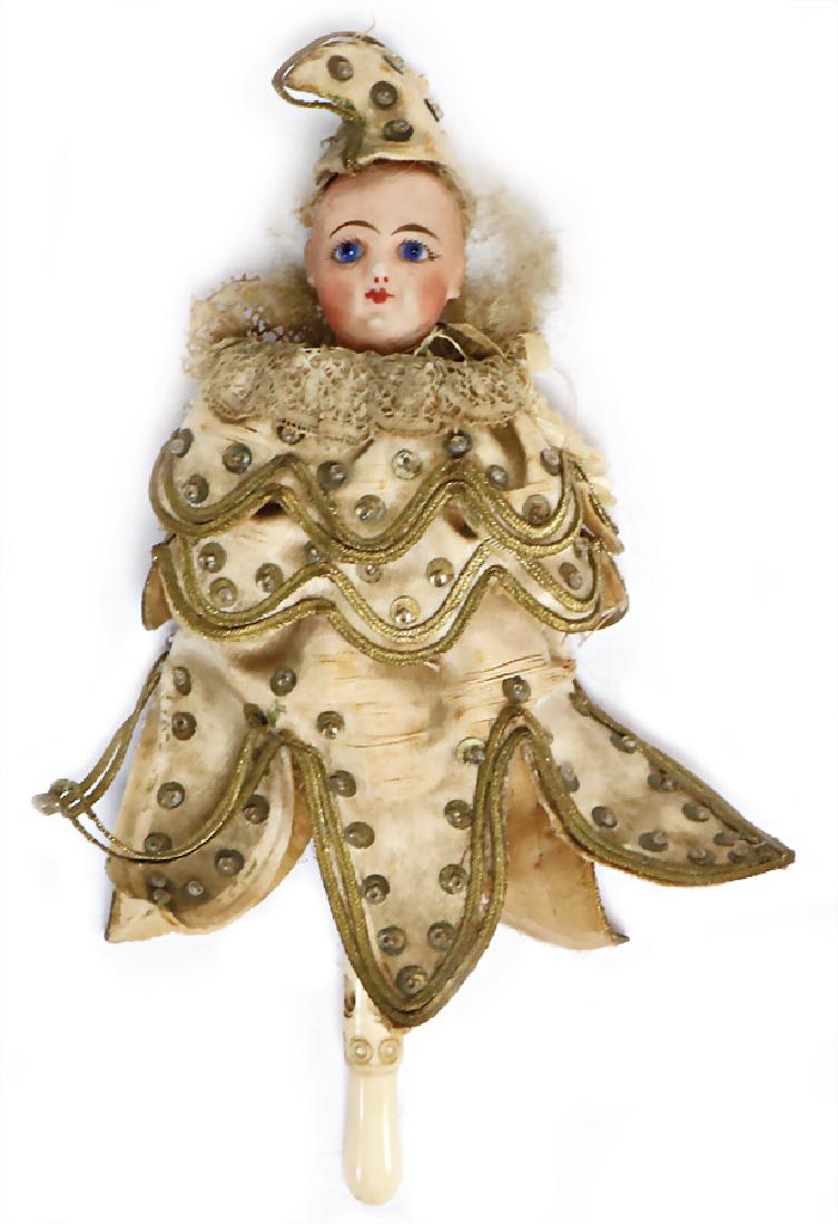 small harlequin, decoration for a French fashion-doll,: small harlequin, decoration for a French fashion-doll, height: 19 cm, bisque shoulder headed doll, fix inset blue glass eyes, closed mouth, original clothes, silk worn, stick, leg (broken) German Desc