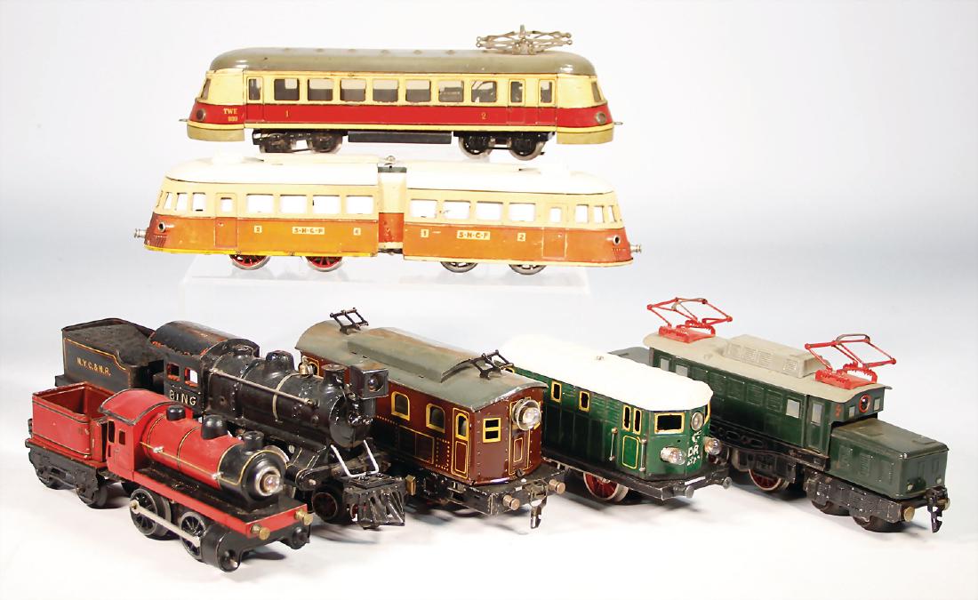 mixed lot with 7 pieces, locomotives and railcar: mixed lot with 7 pieces, locomotives and railcar trains, partially with conversion parts, or partial restored, please have a look at it German Description Konv. 7 Teile, Lokomotiven u. Triebwagen-Züg