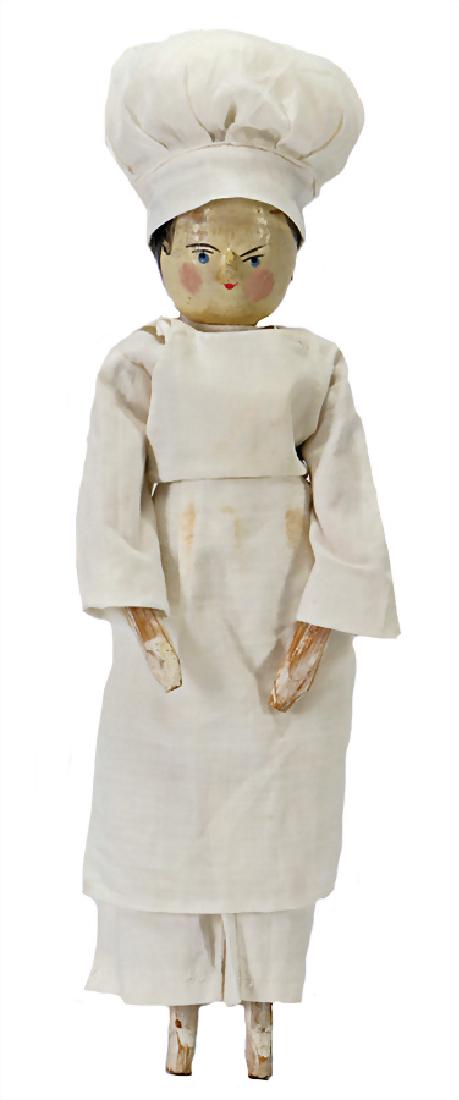 GRöDNERTAL wood doll around 1900, 30 cm, painted hair,: GRöDNERTAL wood doll around 1900, 30 cm, painted hair, painted eyes, slightly stood out nose, jointed wood body, colored hands and feet, dressed like a cook, nice decoration for a kitchen aroun