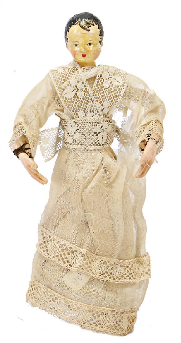 Gröden, early Grödner-head, with the Titus-hairstyle,: Gröden, early Grödner-head, with the Titus-hairstyle, c. 1798, simple body made of fabric and wire only hull and arms, hands are made of wax, this doll was intended as "Christuskind" for a crib made