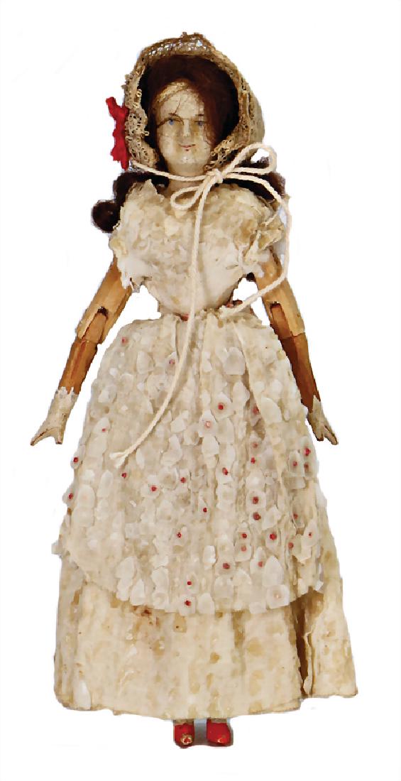 wooden doll, head and hull are carved of onepiece ,: wooden doll, head and hull are carved of onepiece , jointed wood arms and legs, nice original painting, original mohair wig, original clothes, 12.5 cm, c. 1870 German Description Holzpuppe, Kopf u. Ru