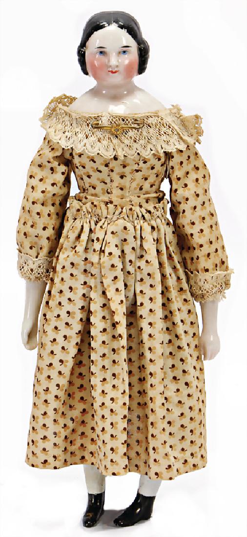 Biedermeie -doll, 25 cm, China-Head (enameled: Biedermeie -doll, 25 cm, China-Head (enameled porcelain), simple fabric body, enameled porcelain arms and-legs, up-painted shoes, nice old dress, one leg with fill loss German Description Biedermeier-