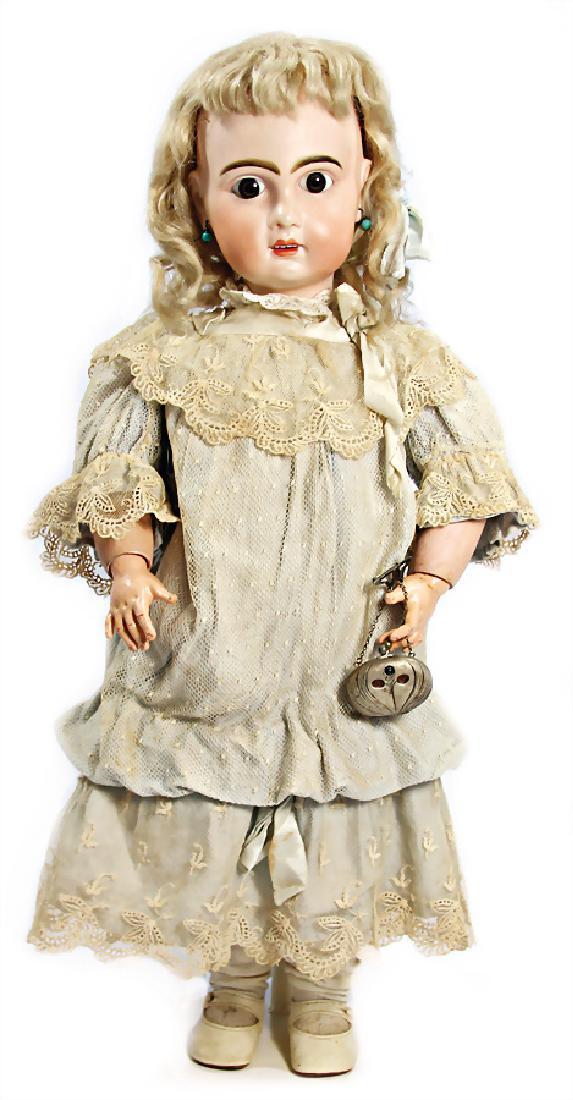 JUMEAU bisque porcelain head doll, 56 cm, marked No. 9,: JUMEAU bisque porcelain head doll, 56 cm, marked No. 9, fix inset brown glass eyes, opened mouth, upper teeth, pierced ears, French jointed body, old underwear, old mohair wig, slight color deviations