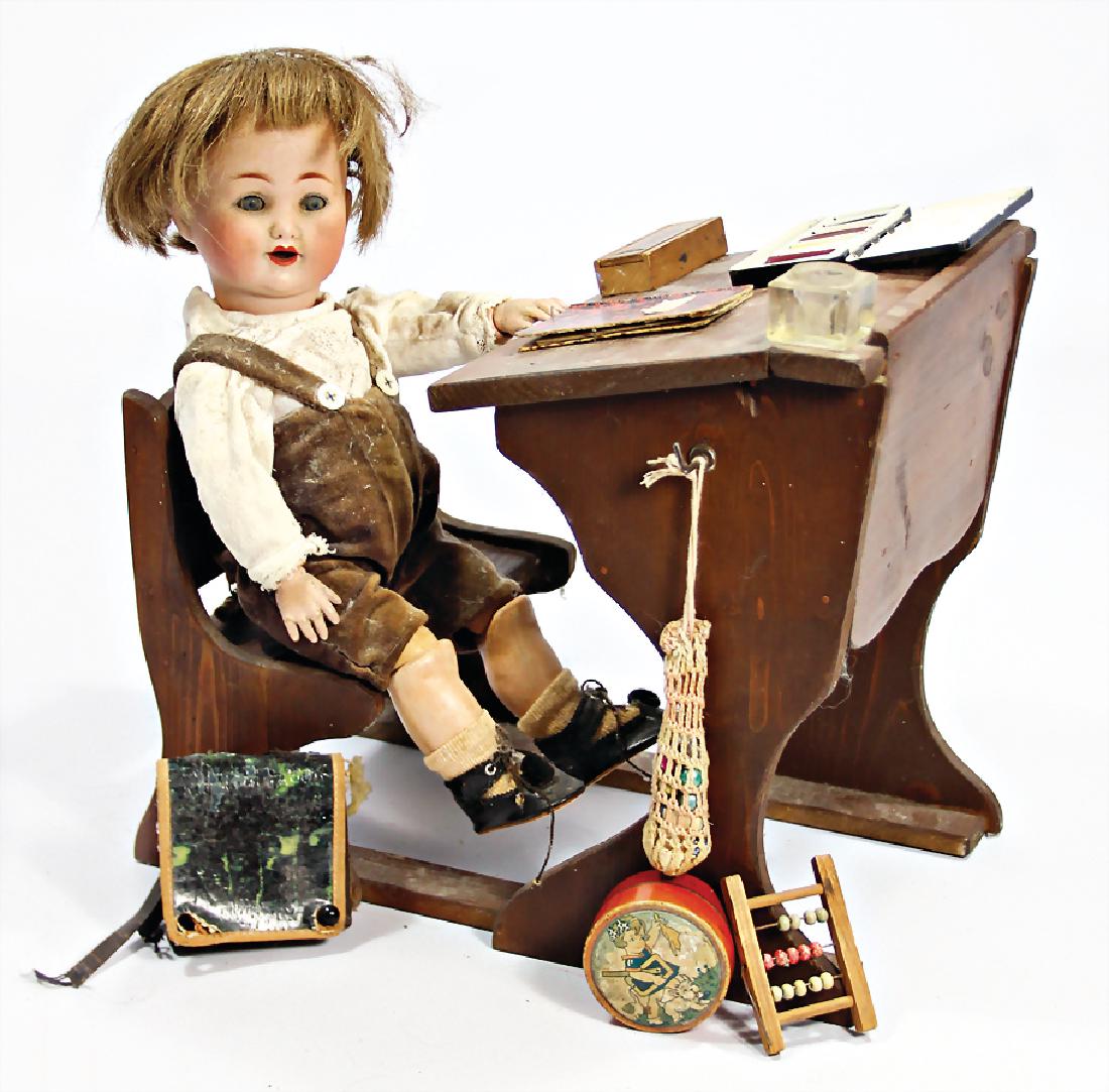 SCHÜTZMEISTER & QUENDT 223, bisque porcelain: SCHÜTZMEISTER & QUENDT 223, bisque porcelain character-doll, 32 cm, boy, blue sleepy eyes, opened mouth, upper teeth, Toddler body, color deviations at the hands, real hair wig, with school bench
