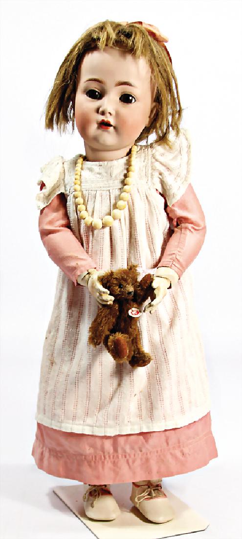 K&R 117 N, bisque porcelain head doll, 56 cm, brown: K&R 117 N, bisque porcelain head doll, 56 cm, brown sleepy eyes, opened mouth, upper teeth, jointed body, old mohair wig, slightl hair loss German Description K&R 117 N; Biskuit-Porzellankopf-Pupp