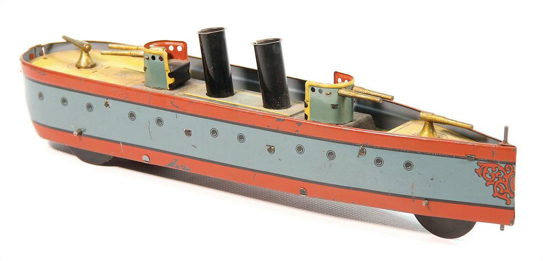 HESS gunboat, sheet metal, lithographed, flywheel: HESS gunboat, sheet metal, lithographed, flywheel drive, 2 anti-aircraft guns, 2 cannons, 2 funnels, 30 cm, good condition (Ex Malcolm Fobes Sammlung NY, Sothebys 2010, Lot 5) German Description HESS