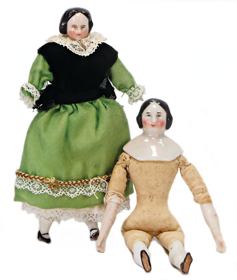 2 dollhouse dolls, Biedermeier, 11.5 and 12.5 cm,: 2 dollhouse dolls, Biedermeier, 11.5 and 12.5 cm, shoulder headed dolls, enameled, fabric body, bisque arms and legs, 1 tiptoe is break off, 1x undressed, 1x clothes are sewed of old fabric German Des