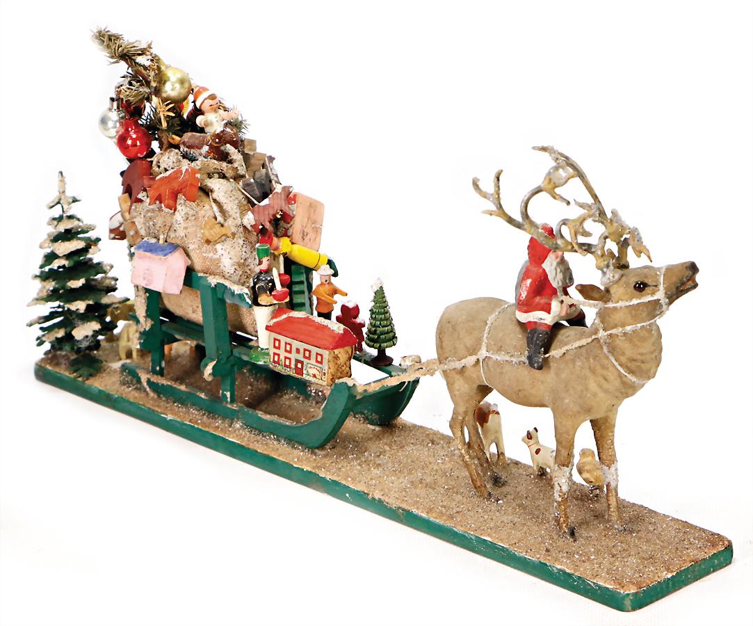 Christmas sledge with Santa Claus and reindeer,: Christmas sledge with Santa Claus and reindeer, wood/mass, lenght: 38 cm German Description Weihnachtsschlitten mit Weihnachtsmann u. Rentier, Holz/Masse, L: 38 cm