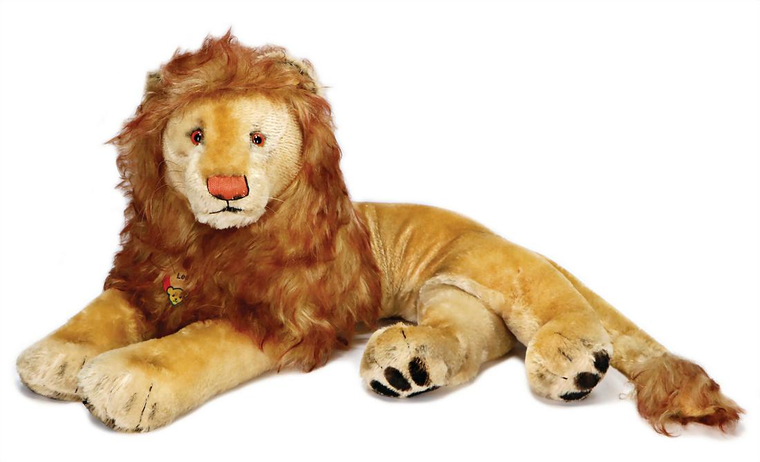 STEIFF leopard, lying, complete with button, sign and (1 of 1)