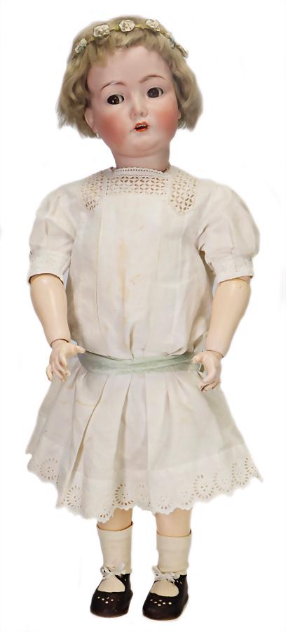 K&R marked 117 N, bisque porcelain character doll,: K&R marked 117 N, bisque porcelain character doll, 70 cm, brown impish eyes, opened mouth, upper teeth, Toddler-body with pulled up knee joints and mass hands, mohair wig, old clothes German Descr
