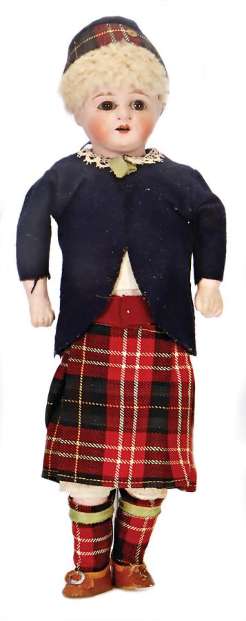 papier mâché shoulder headed doll, fix inset brown : papier mâché shoulder headed doll, fix inset brown glass eyes opened mouth, upper teeth, fabric body, original clothes, pelt-wig German Description Papiermaché-Brustblattkopf-Puppe, braune fe