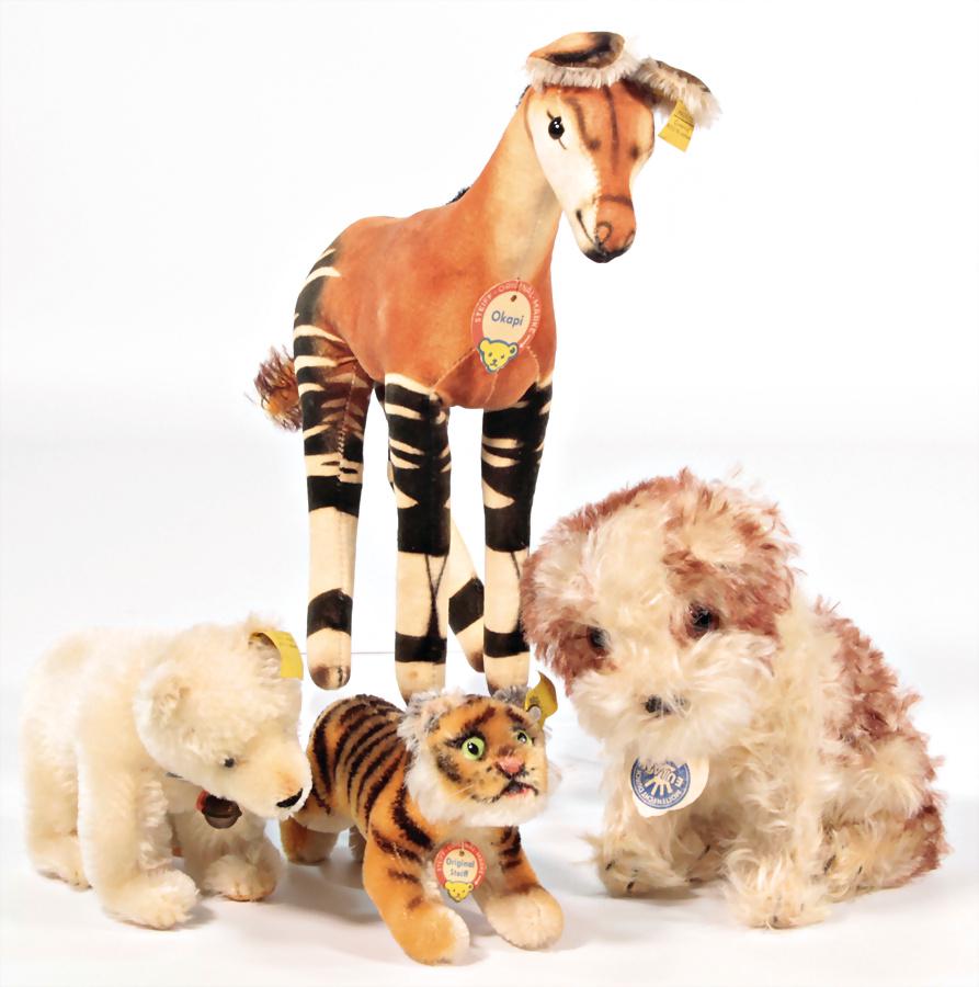 STEIFF Okapi, kompl., Nr. 077028, Molly, kompl. Fahne (1 of 1)