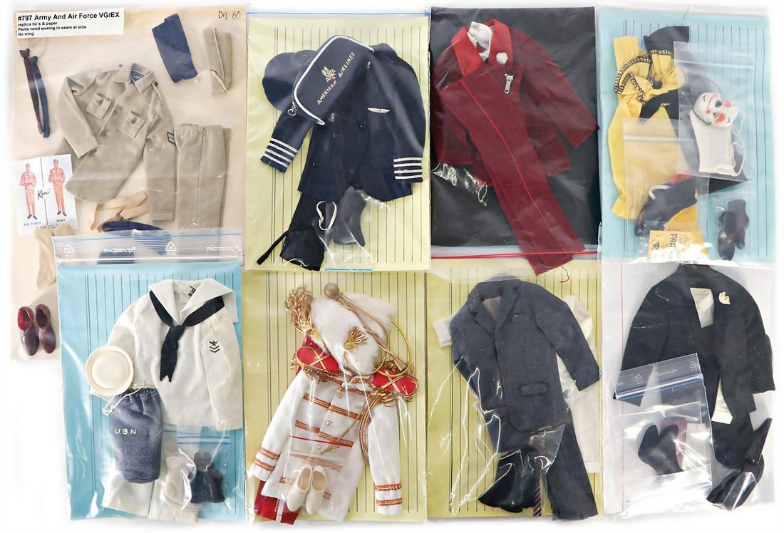 MATTEL Ken, Konv. 8 Outfits, meist kompl. German: MATTEL Ken, Konv. 8 Outfits, meist kompl. German Description MATTEL Ken, Konv. 8 Outfits, meist kompl.