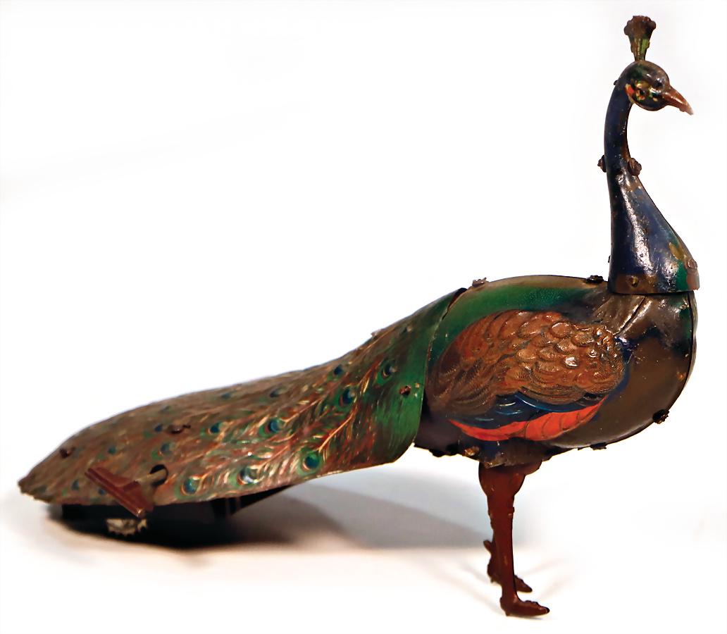 peacock, sheet metal, lithographed, pre-war era, clock: peacock, sheet metal, lithographed, pre-war era, clock mechanism is intact, drive is intact (1 mounting at leg is loose, voice is faulty), lithographed in used condition, good German Description Pfrau