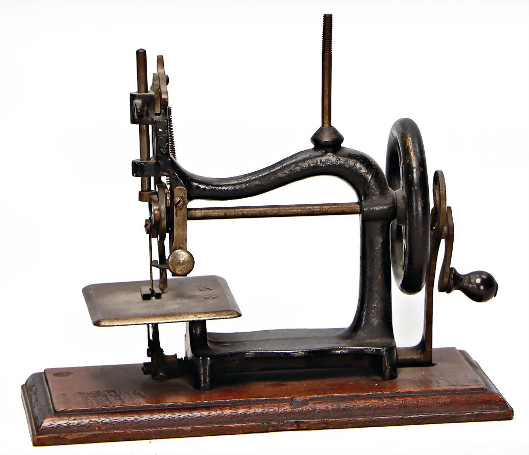 very early children`s sewing machine, casting, mounted (1 of 1)