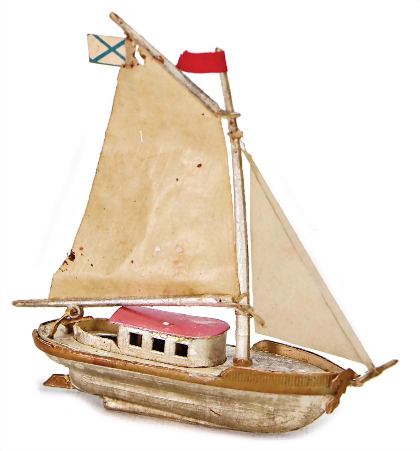 DRESDEN CARDBOARD Christmas tree decoration, sailing: DRESDEN CARDBOARD Christmas tree decoration, sailing ship, 10 cm, front sail was supplemented German Description DRESDNER PAPPE Christbaumschmuck, Segelschiff, 10 cm, vorderes Segel ergänzt
