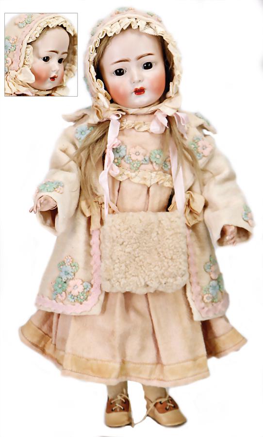 KÄMMER & REINHARDT marked 117n, bisque porcelain socket: KÄMMER & REINHARDT marked 117n, bisque porcelain socket head, character face, brown sleepy eyes, opened mouth, line of upper teeth, tongue, jointed body, with pulled up knee joints, 40 cm, old clothe