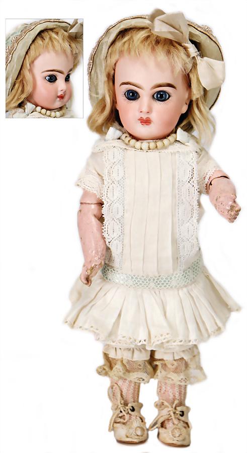 JUMEAU bisque porcelain socket head, French Bébé,: JUMEAU bisque porcelain socket head, French Bébé, marked No. 2, fix inset blue paperweight eyes, closed mouth, pierced ears, French jointed body with fix wrists, old clothes and underwear, wig and h