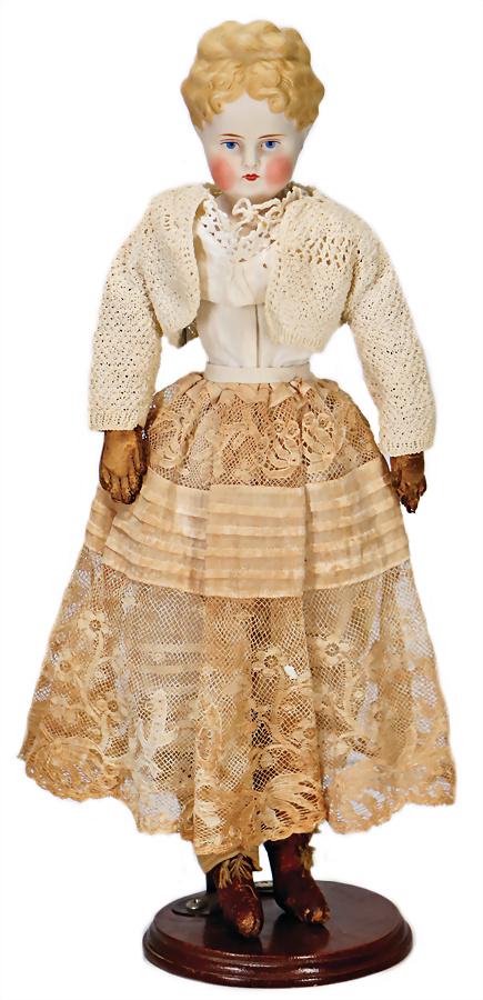 Parian, shoulder headed doll, 39 cm, strong modelled: Parian, shoulder headed doll, 39 cm, strong modelled hair, blue painted eyes, pierced ears, closed mouth, fabric body, leather forearms, appliquéd boots German Description Parian, Brustblattkopf-Pupp