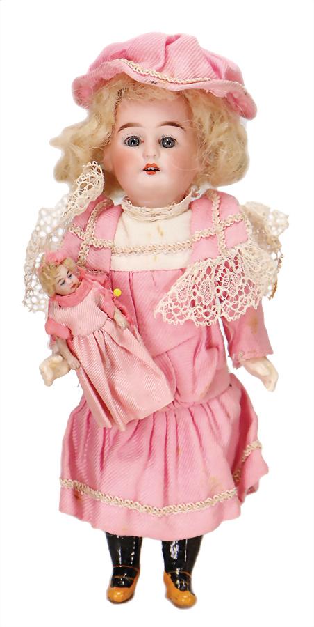 small bisque porcelain head doll, marked Germany 10-0,: small bisque porcelain head doll, marked Germany 10-0, 20 cm, socket head, blue sleepy eyes, opened mouth, upper teeth, standing mass body, with modelled shoes and socks, old mohair wig, with su