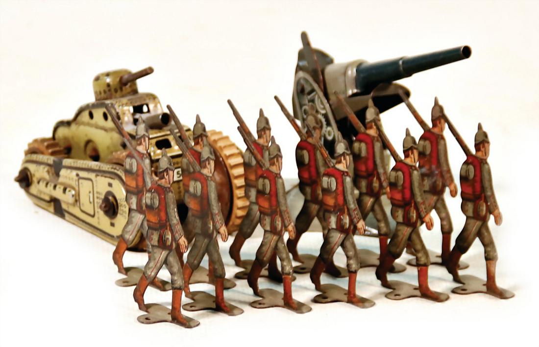 GAMA small tank, sheet metal, lithographed, pre-war: GAMA small tank, sheet metal, lithographed, pre-war era, clock mechanism stucks, small anti-aircraft-gun, some figures, 5 cm, collection Katz German Description GAMA Kl. Tank, Blech, lithogr., Vorkrie