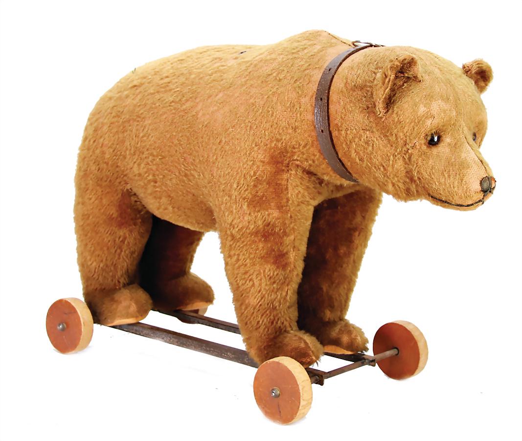 PROBABLY BING bear on rolls, c. 1910, height: 40 cm, (1 of 1)