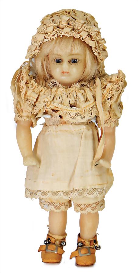 wax doll, around 1875, rare miniature wax doll, from a: wax doll, around 1875, rare miniature wax doll, from a German production, wax shoulder headed doll with closed mouth, fix glass eyes, light blonde mohair wig, fabric body, solid wax arms, finger