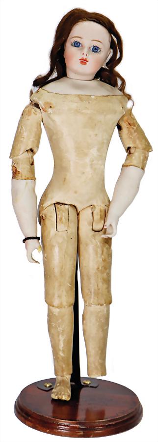 exceptional jointed wood body, leather covered,: exceptional jointed wood body, leather covered, porcelain arms, 1 arm is bleached out and was glued, 1 thumb is missing, 1 foot is missing, original breast plate, head is a reproduction, n
