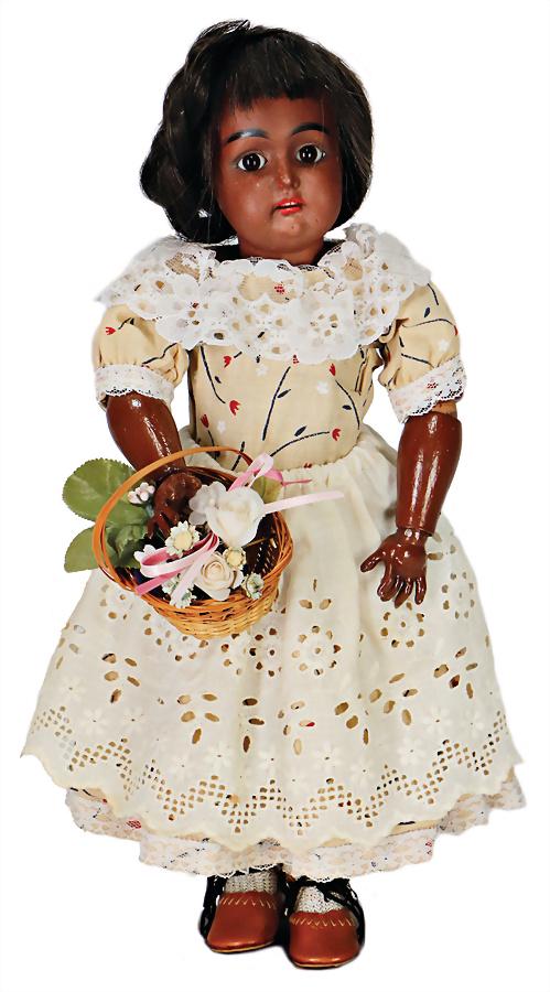 bisque porcelain socket head, colored girl, dark fired: bisque porcelain socket head, colored girl, dark fired bisque, brown sleepy eyes, opened mouth, line of upper teeth, marked Germany, jointed body in good condition, clothes and wig are more recent, th