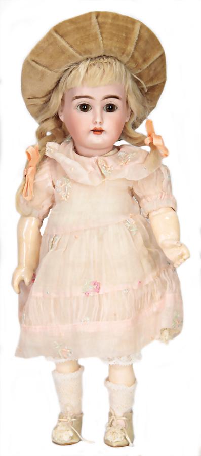 bisque porcelain socket head, child's face, brown: bisque porcelain socket head, child's face, brown sleepy eyes, opened mouth, line of upper teeth, dimple at chin, pierced ears, marked 199-3 Germany, early jointed body, with fix wrists, old plaster c