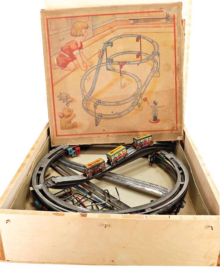 GEBR. EINFALT Achterbahn, Vorkrieg, Orig.-Kart., 1: GEBR. EINFALT Achterbahn, Vorkrieg, Orig.-Kart., 1 zusätzl. Deckbild, 3 Fahrzeuge, Blech, lithogr., 1x guter Zust., 1x Uhrwerk defekt, bespielt, 1x Uhrwerk intakt, Rostfehler an 1 Seite, Blechteile e