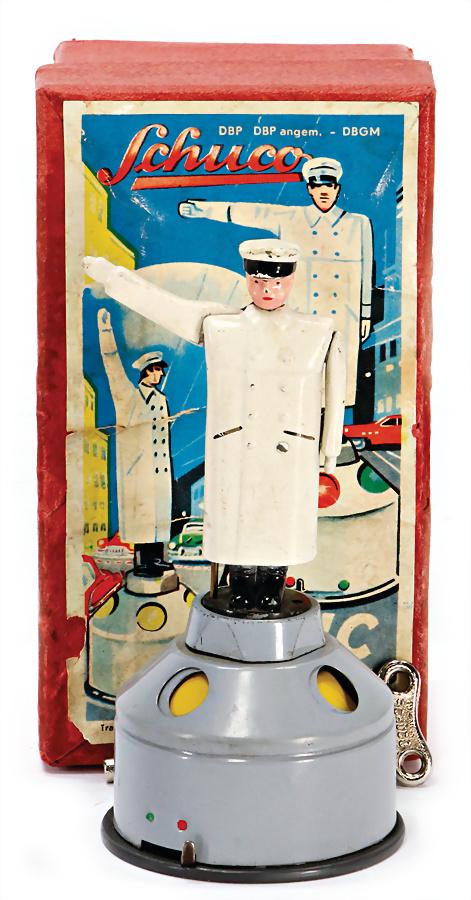 SCHUCO Flik 4520, policeman, 12.5 cm, worn, good (1 of 1)