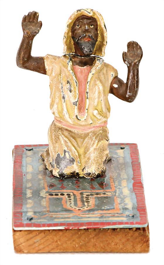 Heyde, Noodlekop-Arab at the prayer, head nodder, (1 of 1)