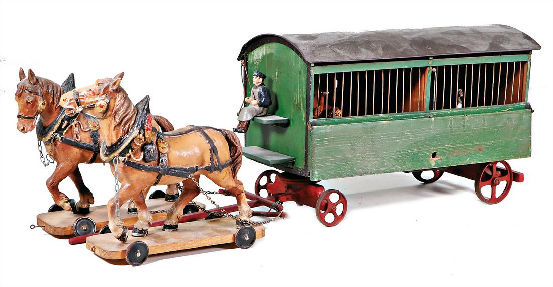 menagerie car, by HANS WILHELM JÜRGENS, Hamburg, with: menagerie car, by HANS WILHELM JÜRGENS, Hamburg, with mass animals, 2 mass draught horses, 56 cm, wood, sheet metal roof , collection Katz German Description Menagerie-Wagen, von HANS WILHELM JÜRGEN