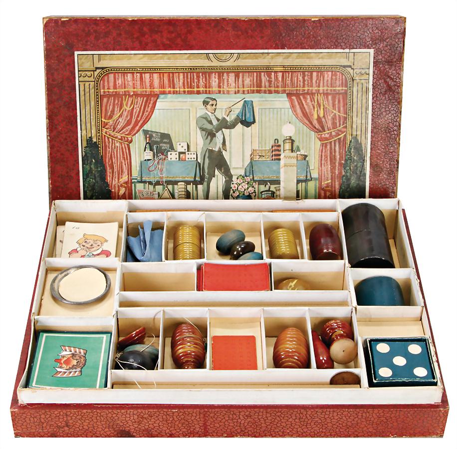early conjuring set, in the original box, with richly: early conjuring set, in the original box, with richly utensils, cards, conjurer's wand, and much more, without instructions for use, width: 42 cm, height: 33 cm, depth: 8 cm, very good preserved Germa