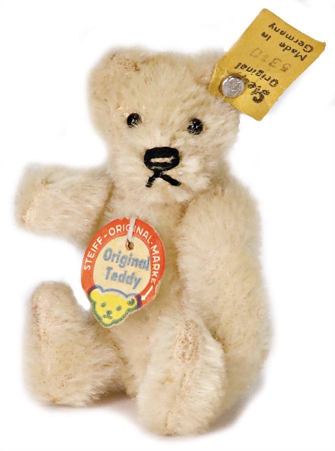 STEIFF original teddy, with button, chest label and: STEIFF original teddy, with button, chest label and cloth tag label, No. 5310, white mohair, unused condition, 8 cm German Description STEIFF Orig.-Teddy, mit Knopf, Schild u. Fahne, Nr. 5310, weißes