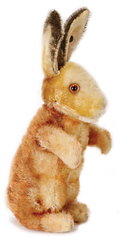 STEIFF hare, produced around 1930, attending, with: STEIFF hare, produced around 1930, attending, with button, block letters, long stretched F, except of minimally places in mohair in very nice condition, swivel head, glass eyes, top of the ears with d