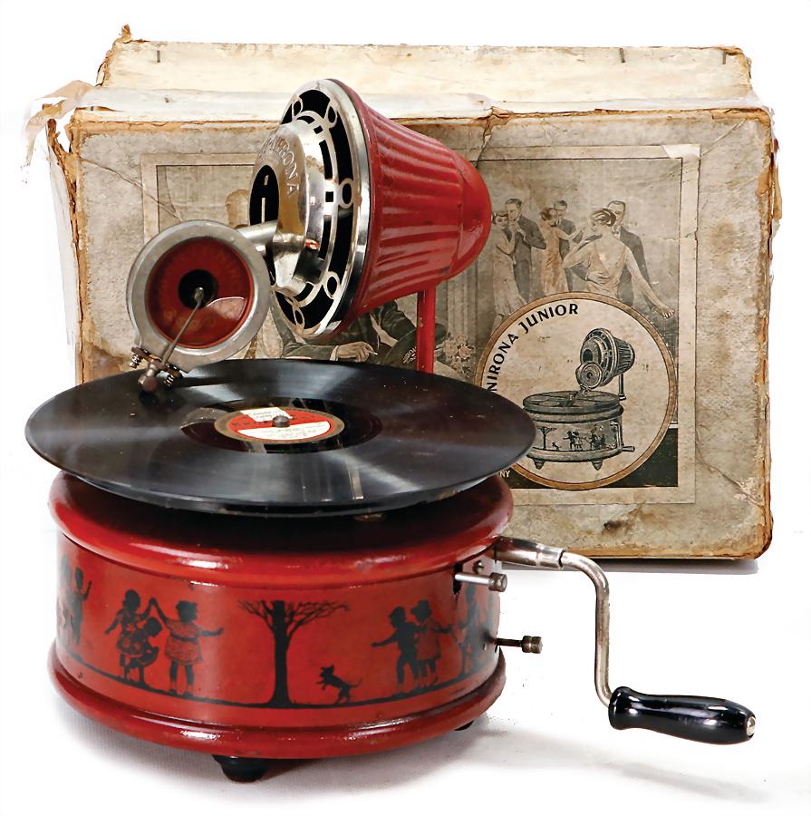 gramophone for children, Nifty-Nirona, German, sheet metal, diameter: 18 cm, with motives for: gramophone for children, Nifty-Nirona, German, sheet metal, diameter: 18 cm, with motives for childrens, clock mechanism is intact, paint with formation of spider lines, in original box, caused of old