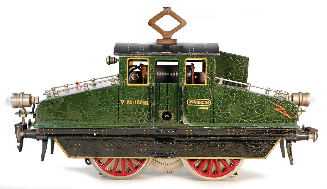 MÃ„RKLIN gauge 1, V6513021, 20V, electric-standard gauge -locomotive, B, 26 cm, roof was: MÃ„RKLIN gauge 1, V6513021, 20V, electric-standard gauge -locomotive, B, 26 cm, roof was supplemented, formation of spider lines German Description MÃ„RKLIN Spur 1, V6513021, 20V, Elektro-Vollba