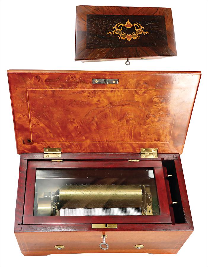 barrel music box, 29.5 cm x 15.5 cm x 14 cm, nice intarsia, nice, full sound, intact German: barrel music box, 29.5 cm x 15.5 cm x 14 cm, nice intarsia, nice, full sound, intact German Description Walzenmusikspieldose, 29,5 cm x 15,5 cm x 14 cm, schÃ¶ne Einlegearbeit, schÃ¶ner, voller Kla