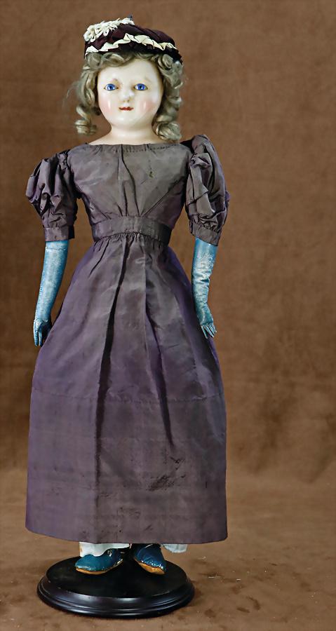 papier mâché shoulder headed doll, wax coated, England, c. 1820, 46 cm, mohair wig, fix: papier mâché shoulder headed doll, wax coated, England, c. 1820, 46 cm, mohair wig, fix inset blue glass eyes, fabric body, blue leather arms, old clothes, underwear, shoes and socks, 
