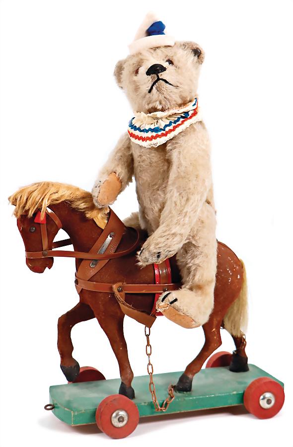 STEIFF clown-bear, with button, block letters, long trailing f, glass eyes, long snaped off arms, (1 of 4)