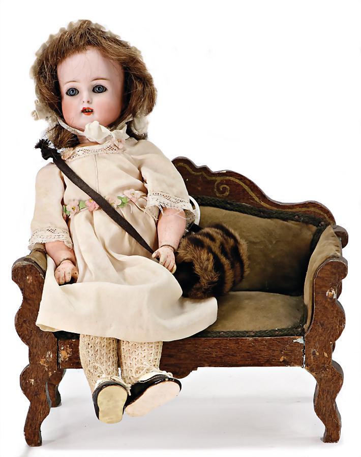 KÄMMER & REINHARDT No. 30, bisque porcelain socket head, blue sleepy eyes, line of upper: KÄMMER & REINHARDT No. 30, bisque porcelain socket head, blue sleepy eyes, line of upper teeth, 1 tooth is missing, jointed mass body, old real hair wig, 30 cm, with a small doll's sofa