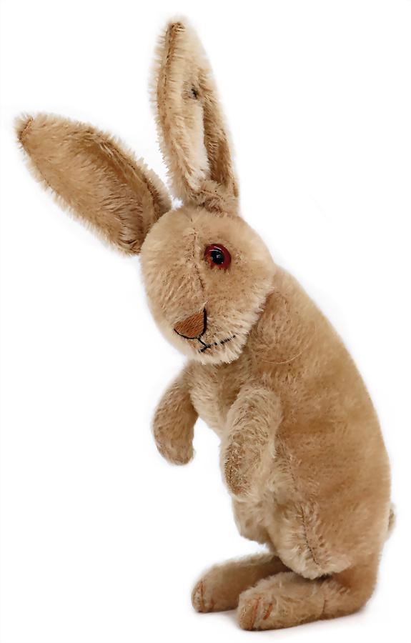 STEIFF hare, attending, produced 1927-31, originally pink-colored mohair, color is strongly bleached (1 of 4)
