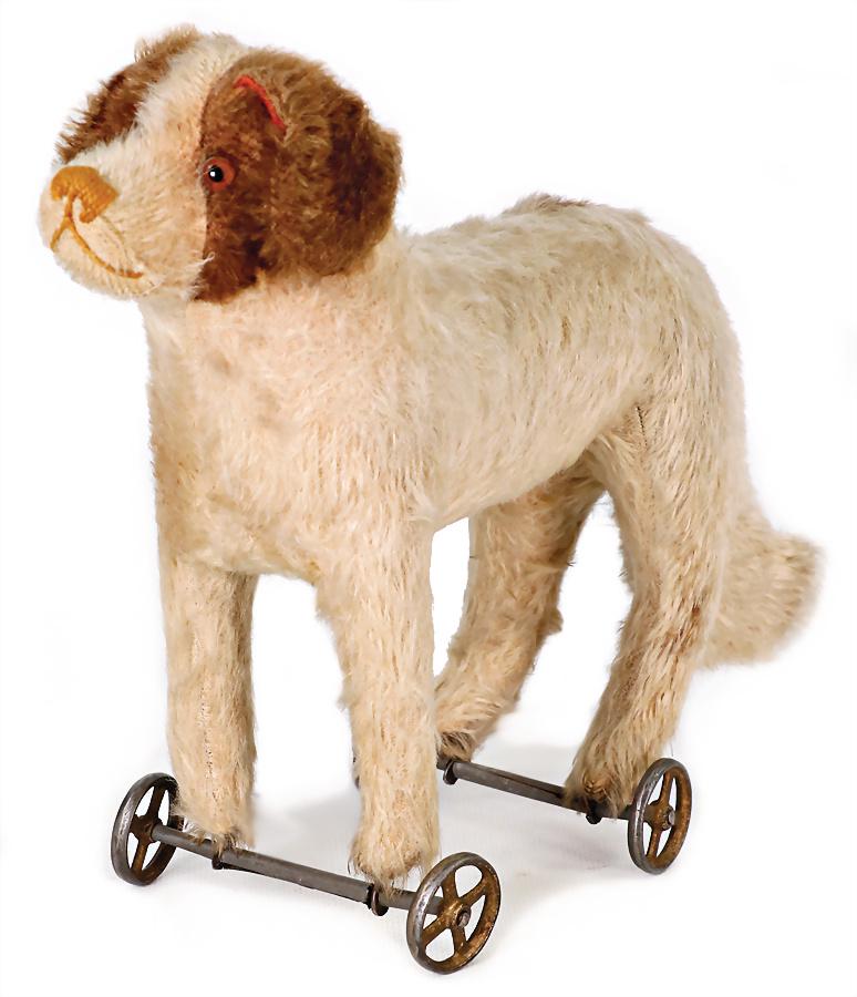 STEIFF dog, St. Bernhard, around 1904, on casting wheels with spokes, glass eyes, bright (1 of 3)