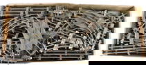 1 box of sheet-metal rails, partially a bit flash rust, sundry switches, straight rails German
