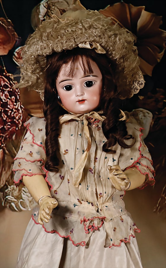 GAULTIER bisque porcelain socket head, French Bébé, marked 12 F.G. in cartouche, fix inset: GAULTIER bisque porcelain socket head, French Bébé, marked 12 F.G. in cartouche, fix inset brown paperweight eyes, opened mouth, line of upper teeth, pierced ears, teeth were partially