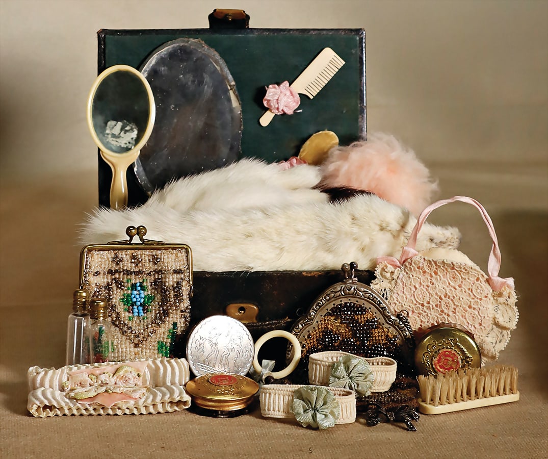 doll's accessories , small leather suitcase with coiffeur items, small perfume bottles, brush, comb, (1 of 2)